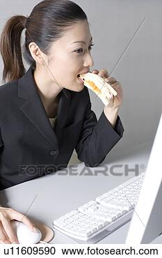 Stock Photography - woman operating 
a pc. fotosearch 
- search stock 
photos, pictures, 
images, and photo 
clipart