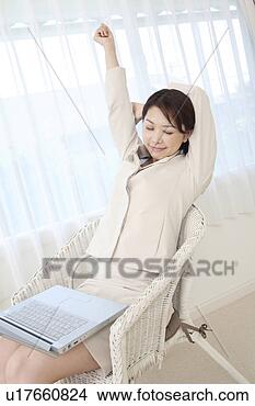 Stock Photo - woman who stretches 
herself. fotosearch 
- search stock 
photos, pictures, 
images, and photo 
clipart