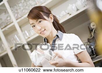 Stock Photo - sales person in 
the coffee shop. 
fotosearch - search 
stock photos, 
pictures, images, 
and photo clipart