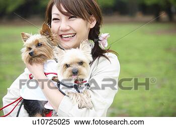 Stock Image - woman and dogs. 
fotosearch - search 
stock photos, 
pictures, images, 
and photo clipart