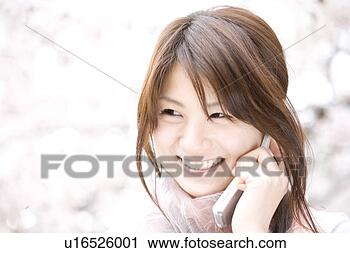 Stock Photography - woman under the 
cherry tree. fotosearch 
- search stock 
photos, pictures, 
images, and photo 
clipart