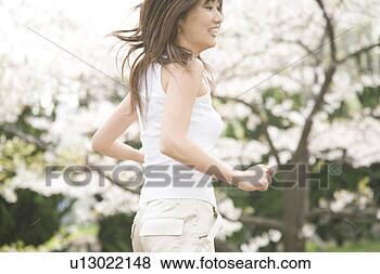 Stock Photo - cherry tree and 
woman. fotosearch 
- search stock 
photos, pictures, 
images, and photo 
clipart