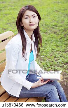 Stock Photo - woman who reads 
with the bench. 
fotosearch - search 
stock photos, 
pictures, images, 
and photo clipart