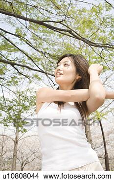 Stock Photo - woman who does 
stretching. fotosearch 
- search stock 
photos, pictures, 
images, and photo 
clipart
