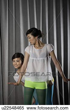Stock Image - a portrait of 
two young women. 
fotosearch - search 
stock photos, 
pictures, images, 
and photo clipart