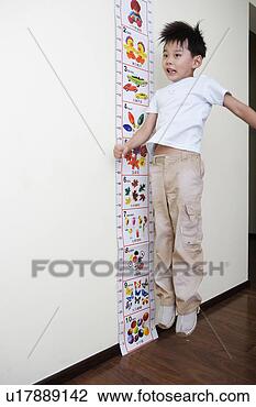Stock Photo - boy jumping beside 
height ruler. 
fotosearch - search 
stock photos, 
pictures, images, 
and photo clipart