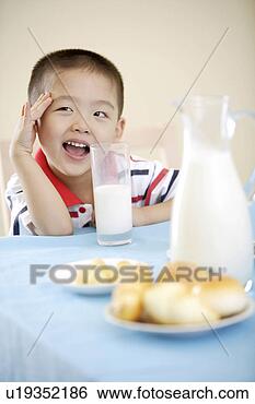 Stock Photo - boy with milk 
and bread. fotosearch 
- search stock 
photos, pictures, 
images, and photo 
clipart