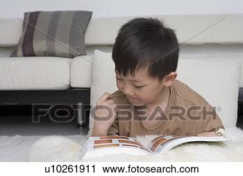 Stock Photography - boy reading book. 
fotosearch - search 
stock photos, 
pictures, images, 
and photo clipart