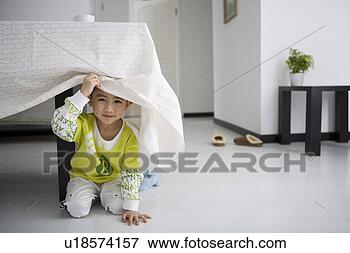 Picture - boy under table. 
fotosearch - search 
stock photos, 
pictures, images, 
and photo clipart