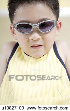 Stock Photograph - boy wearing sunglasses. 
fotosearch - search 
stock photos, 
pictures, images, 
and photo clipart