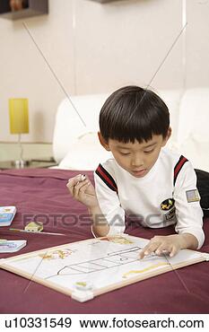 Stock Photograph - a drawing boy. 
fotosearch - search 
stock photos, 
pictures, images, 
and photo clipart