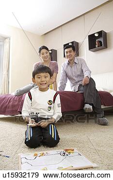 Stock Photograph - happy family. 
fotosearch - search 
stock photos, 
pictures, images, 
and photo clipart