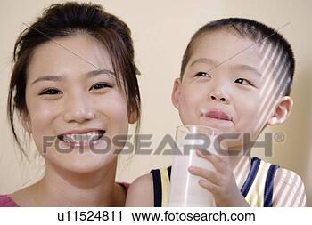 Stock Photography - mother and milk-drinking 
son. fotosearch 
- search stock 
photos, pictures, 
images, and photo 
clipart
