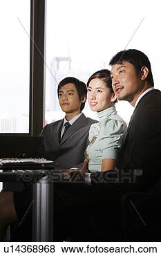 Stock Photo - a portrait of 
two office men 
and woman in office. 
fotosearch - search 
stock photos, 
pictures, images, 
and photo clipart
