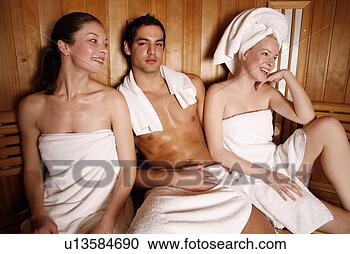 Stock Photography - man with two young 
women enjoying 
a sauna. fotosearch 
- search stock 
photos, pictures, 
images, and photo 
clipart