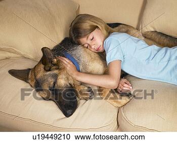Stock Photography - young girl sleeping 
on her dog. fotosearch 
- search stock 
photos, pictures, 
images, and photo 
clipart