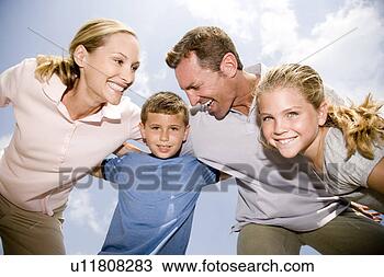 Stock Photo - family of four
hugging each other.
fotosearch - search
stock photos,
pictures, wall
murals, images,
and photo clipart