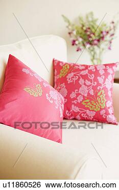 Stock Photo - close-up of two 
cushions on an 
armchair. fotosearch 
- search stock 
photos, pictures, 
images, and photo 
clipart