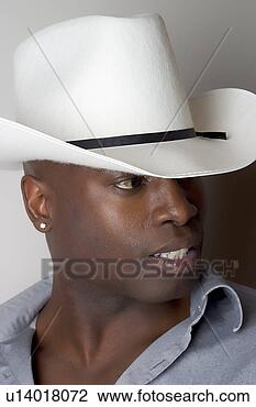 Stock Photo - black cowboy. 
fotosearch - search 
stock photos, 
pictures, images, 
and photo clipart