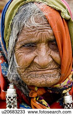 Stock Photo - elderly indian 
tribal lady or 
lambadi in traditional 
clothing. fotosearch 
- search stock 
photos, pictures, 
images, and photo 
clipart