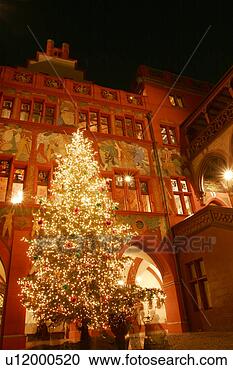 Stock Photography - giant christmas 
tree inside the 
court-yard of 
basel city hall 
- basel. fotosearch 
- search stock 
photos, pictures, 
images, and photo 
clipart
