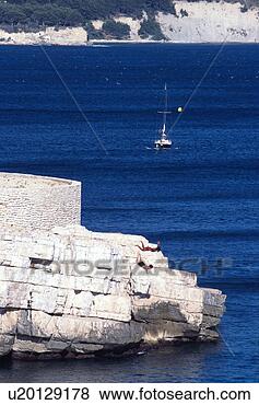 Stock Photo - jump diving in 
blue mediterranean 
sea. fotosearch 
- search stock 
photos, pictures, 
images, and photo 
clipart