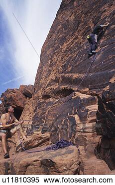 Stock Image - rock climber red 
rocks nevada usa. 
fotosearch - search 
stock photos, 
pictures, images, 
and photo clipart