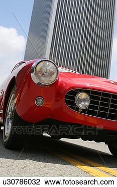 Stock Photo - vintage convertible 
in front of century 
city tower. fotosearch 
- search stock 
photos, pictures, 
images, and photo 
clipart