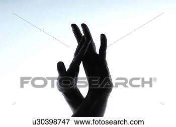 Picture - silhouettes of 
male and female 
hand touching. 
fotosearch - search 
stock photos, 
pictures, images, 
and photo clipart