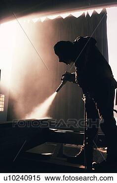 Stock Image - factory worker 
sandblasting industrial 
equipment. fotosearch 
- search stock 
photos, pictures, 
wall murals, images, 
and photo clipart