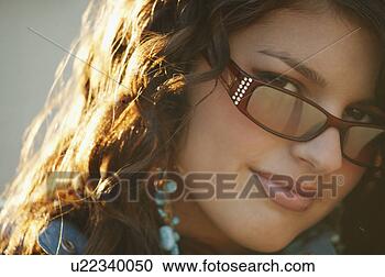Stock Photography - attractive woman 
wearing trendy 
sunglasses. fotosearch 
- search stock 
photos, pictures, 
images, and photo 
clipart