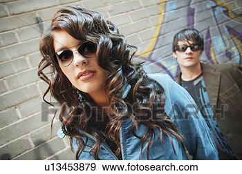 Stock Photograph - fashionable male 
and female models. 
fotosearch - search 
stock photos, 
pictures, images, 
and photo clipart