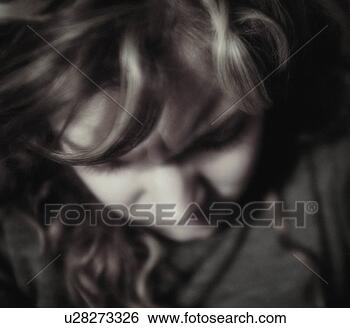 Stock Photo - woman with head 
down. fotosearch 
- search stock 
photos, pictures, 
images, and photo 
clipart