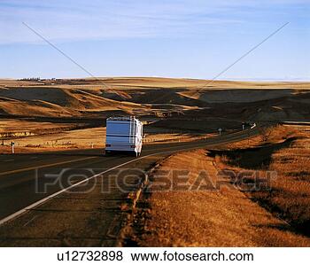 Stock Photo - an rv travelling 
down the hiway. 
fotosearch - search 
stock photos, 
pictures, images, 
and photo clipart