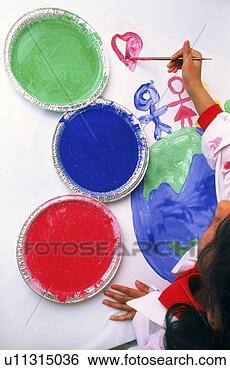 Stock Photo - child painting. 
fotosearch - search 
stock photos, 
pictures, images, 
and photo clipart