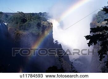 Stock Photo - victoria falls, 
zimbabwe. fotosearch 
- search stock 
photos, pictures, 
images, and photo 
clipart
