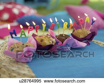 Stock Image - cakes saying happy 
birthday with 
candles. fotosearch 
- search stock 
photos, pictures, 
wall murals, images, 
and photo clipart