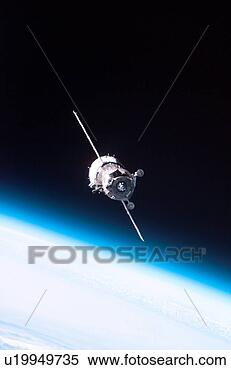 Stock Image - backdropped by 
the blackness 
of space and earth's 
horizon the soyuz. 
fotosearch - search 
stock photos, 
pictures, images, 
and photo clipart