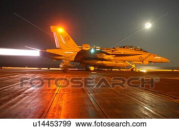 Stock Photograph - launch, aircraft, 
f18, f/a-18f super 
hornet, airplane, 
afterburner. fotosearch 
- search stock 
photos, pictures, 
images, and photo 
clipart