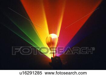 Stock Image - a lightbulb illuminated 
with an array 
of rainbow colors 
from a laser. 
fotosearch - search 
stock photos, 
pictures, images, 
and photo clipart