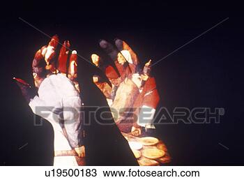 Stock Photo - special effects 
composite of posterized 
silhouette of 
two hands and. 
fotosearch - search 
stock photos, 
pictures, images, 
and photo clipart
