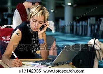 Stock Photo - female executives 
at airport. fotosearch 
- search stock 
photos, pictures, 
images, and photo 
clipart