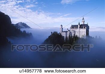 Stock Photo - gothic castle 
on misty mountaintop. 
fotosearch - search 
stock photos, 
pictures, images, 
and photo clipart