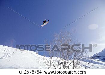 Stock Photo - snowboarder getting 
huge air. fotosearch 
- search stock 
photos, pictures, 
images, and photo 
clipart