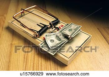 Stock Photograph - mouse trap with 
money in it. fotosearch 
- search stock 
photos, pictures, 
images, and photo 
clipart