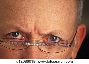 Stock Photo - man's eyes frowning. 
fotosearch - search 
stock photos, 
pictures, images, 
and photo clipart