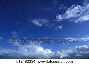 Stock Photo - wispy white clouds 
in a blue sky. 
fotosearch - search 
stock photos, 
pictures, images, 
and photo clipart