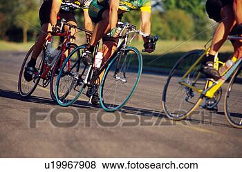 Stock Photo - bike racer legs. 
fotosearch - search 
stock photos, 
pictures, images, 
and photo clipart
