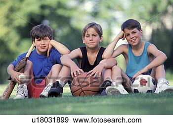Stock Photograph - little boys playing 
sports. fotosearch 
- search stock 
photos, pictures, 
images, and photo 
clipart