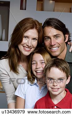 Stock Photograph - portrait of two 
parents and two 
children. fotosearch 
- search stock 
photos, pictures, 
images, and photo 
clipart